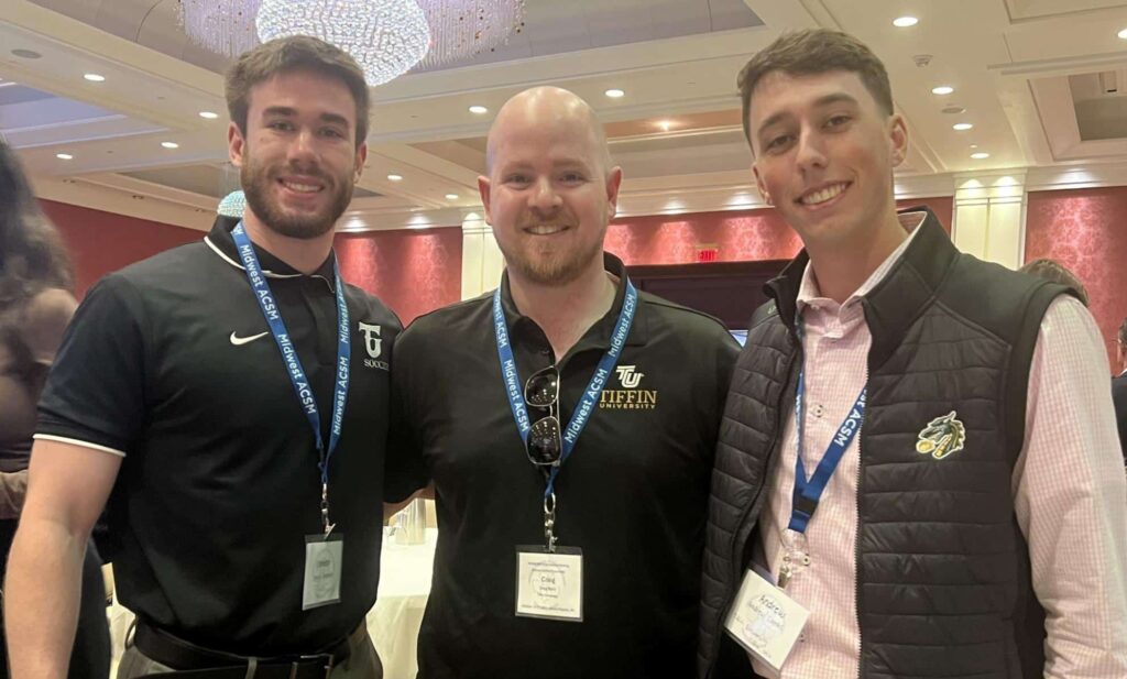 Connor Webster, Dr. Craig W. Berry, and Andrew Combs at the keynote lecture on the final day of the ACSM conference
