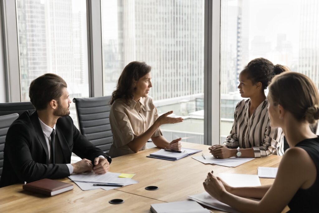 HLC team discussing regionally accredited online colleges