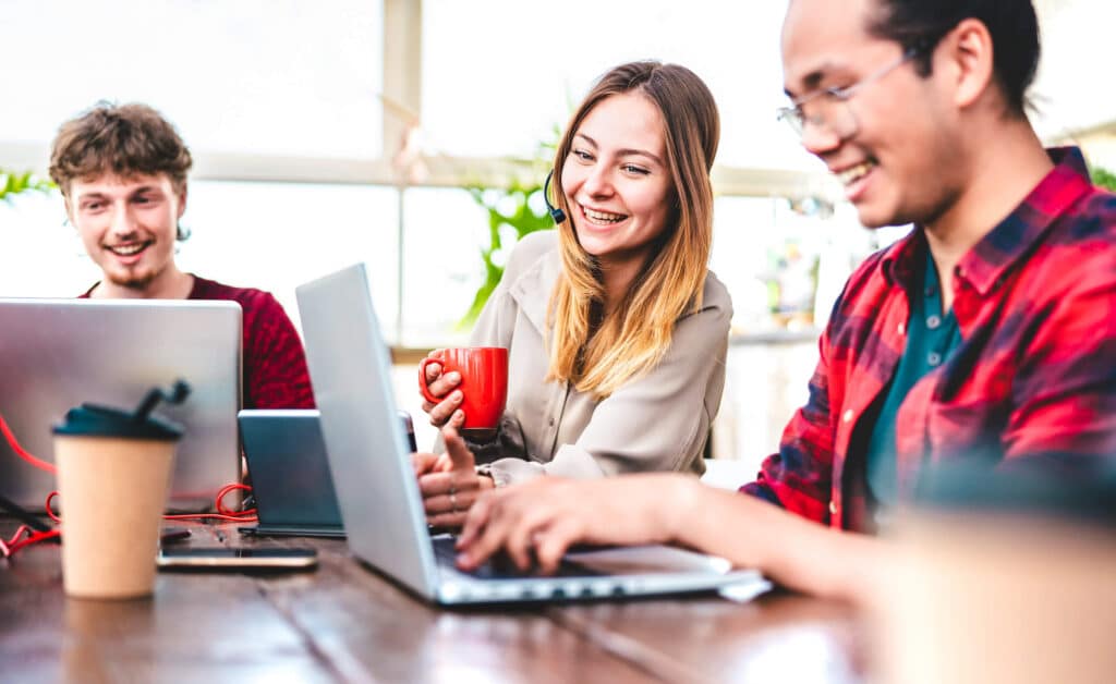 young professionals at laptops