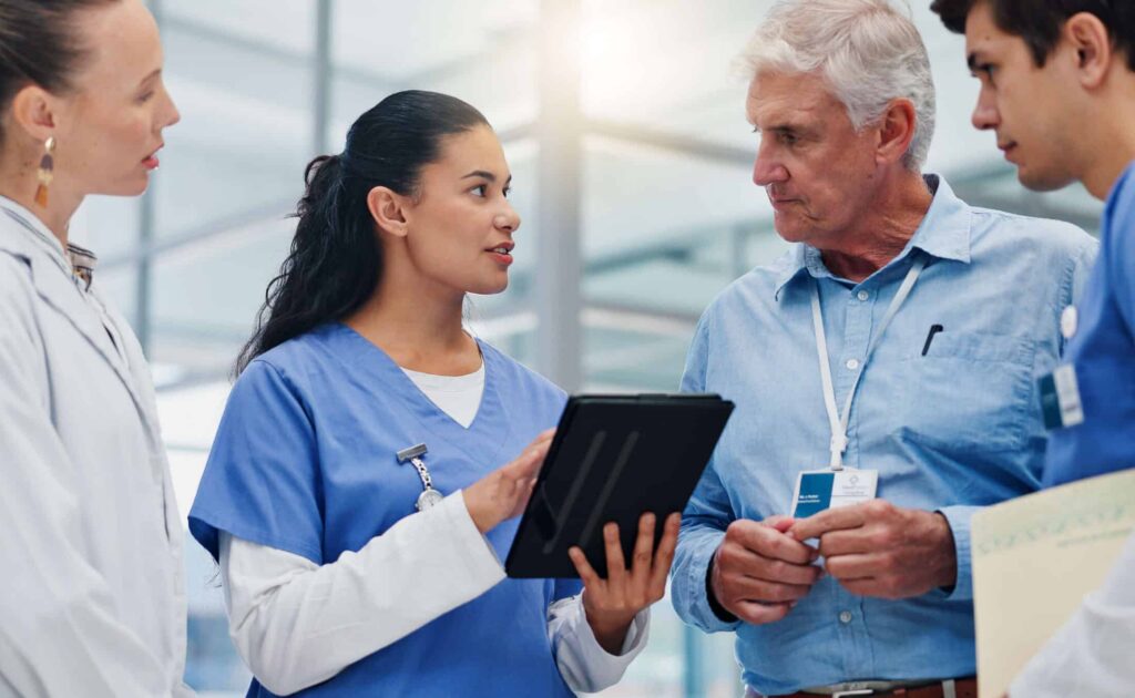 nurse leader discussing plans with team