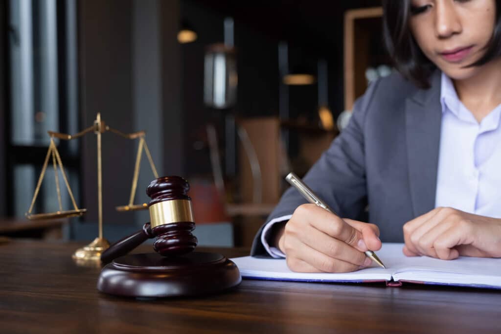 gavel and scale on judge's desk